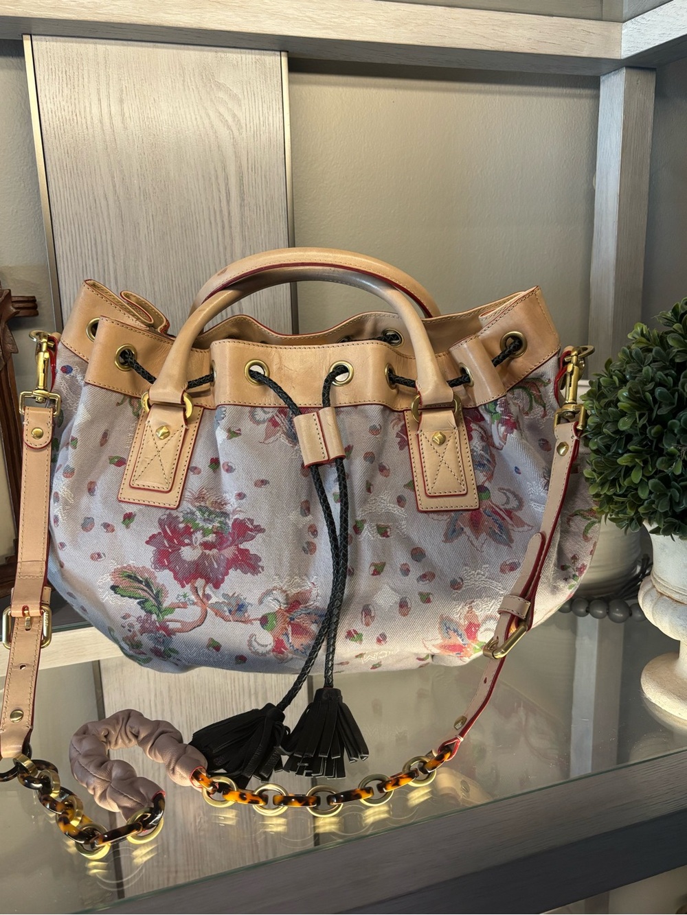 MCM Limited Edition Floral Canvas and Leather Tassel Drawstring Bag w/COA
